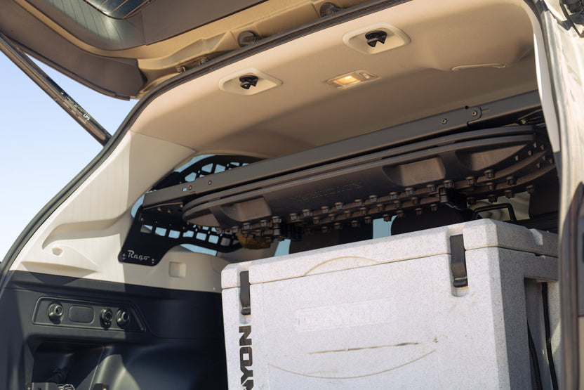 Molle Panel Storage Shelf for the 2019-2024 Subaru Forester with traction boards mounted underneath