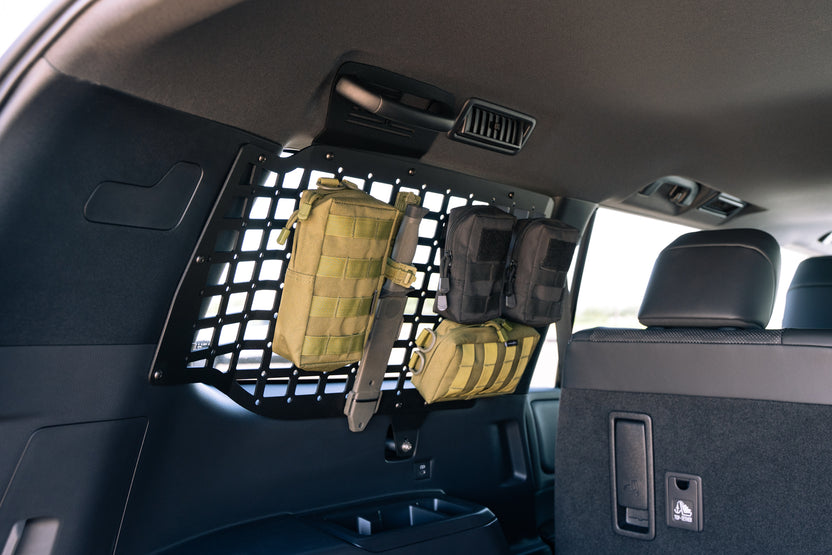 Toolkit and extinguisher on the 2024 Toyota Land Cruiser Rear Window Molle Storage Panels