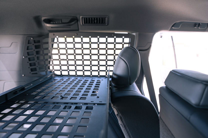 Toolbox on the Molle Panel Storage Shelf for the 2024 Toyota Land Cruiser in high-position