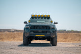 Front view of Rago Fabrication's LP6 Round Light Mount installed to a Rago Roof Rack.