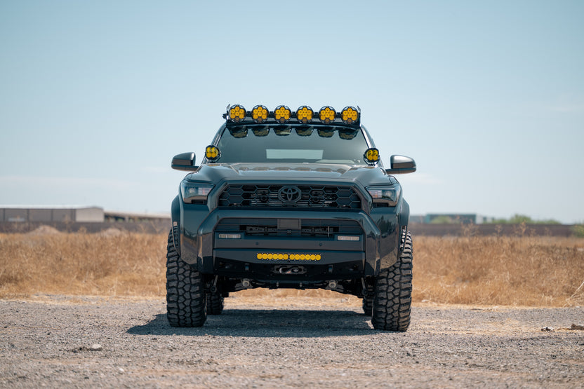 Front view of Rago Fabrication's LP6 Round Light Mount installed to a Rago Roof Rack.