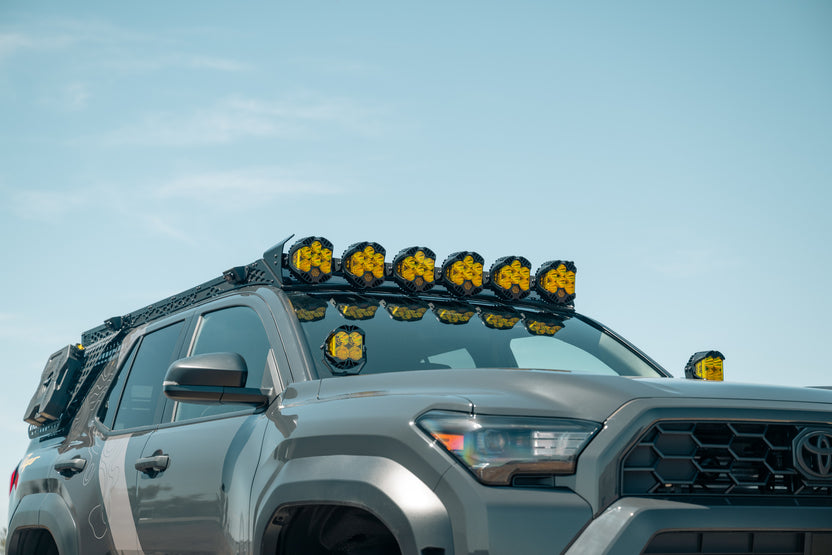 A Round Roof Rack Light Mount installed to a 6th Gen 4Runner Light Pocket Roof Rack.