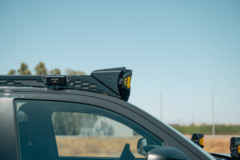 Side profile of the Roof Rack Round Light Mount installed to a Rago 4Runner Roof Rack.