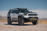Fully built out 6th Gen 4Runner with the Rago Roof rack, molle panels, bumpers, and Rock Slider Side Steps