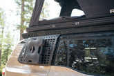 GX 550 fully equipped on camping trip with roof rack, roof-top tent, and our exterior molle panels