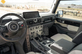 Driver view with phone mount on the Center Console Molle Panels for the 2022-2026 INEOS Grenadier & Quartermaster