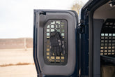 Add gear for quick access on our Driver side 2022-2026 INEOS Grenadier Rear Door Window Molle Panel