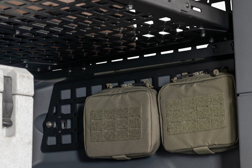 Pouches mounted to the Rear Window Molle Storage Panels for the 2022-2026 INEOS Grenadier