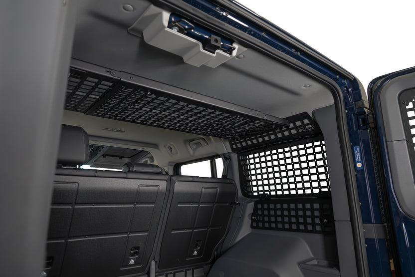 Installed Rear Window Molle Storage Panels for the 2022-2026 INEOS Grenadier with the high mount shelf also installed.
