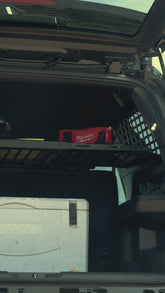 Rago's Rear Window Molle Panels and Shelf optimizing a 6th Gen 4Runner's rear cargo space.