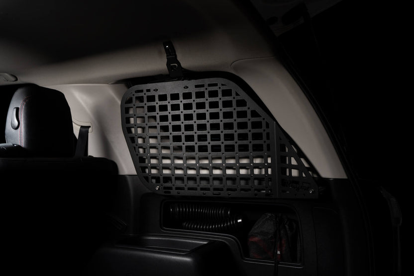 5th Gen 4Runner Molle Panel Installed on rear window. Lighting highlights the molle panel.