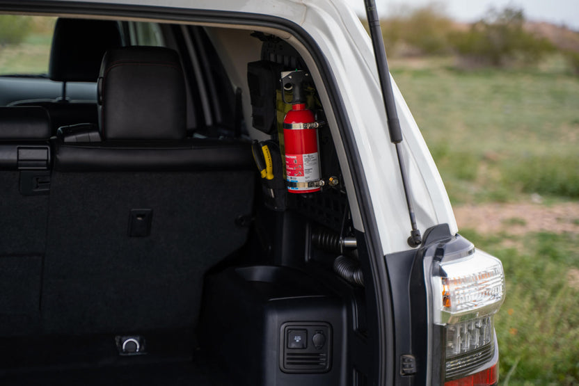 5th Gen 4Runner Molle Panel Installed. Outdoor Picture with fire extinguisher installed.